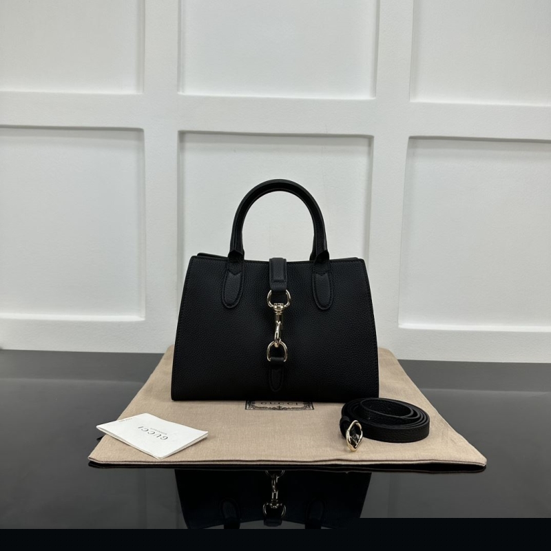 G*u*i top handle bags